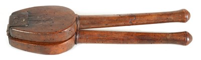 Lot 320 - AN UNUSUAL PAIR OF LATE 17TH CENTURY WALNUT TREENWARE NUT CRACKERS