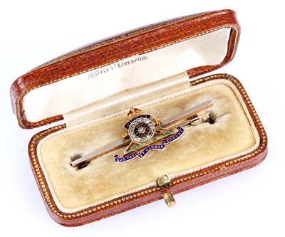 Lot 26 - A 14ct GOLD AND ENAMEL ROYAL ARTILLERY BAR...