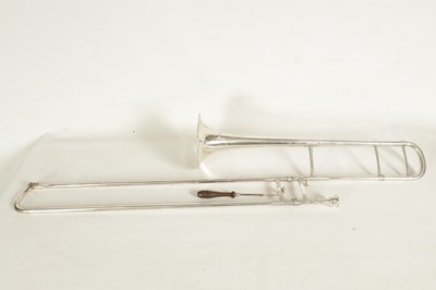 Lot 109 - A MID 20TH CENTURY SILVERED BRASS AND BRIGHT CUT MOUNTED CASED TROMBONE