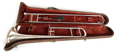 Lot 109 - A MID 20TH CENTURY SILVERED BRASS AND BRIGHT CUT MOUNTED CASED TROMBONE