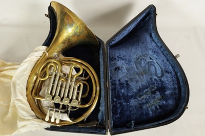 Lot 136 - A 20TH CENTURY WELTKLANG BRASS AND SILVERED FRENCH HORN