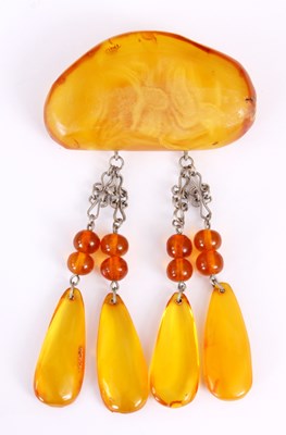 Lot 368 - A LARGE AMBER BROOCH with pear shape amber...