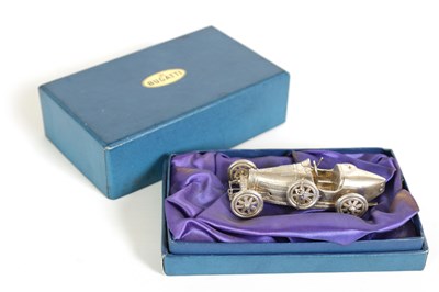 Lot 263 - A BOXED LIMITED EDITION 17/200 SOLID SILVER T-35 BUGATTI