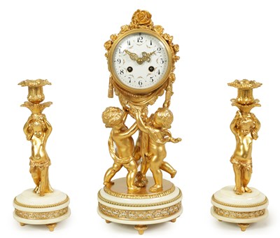 Lot 407 - A LATE 19TH CENTURY FRENCH GILT METAL THREE PIECE CLOCK GARNITURE