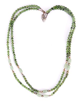 Lot 375 - A DOUBLE STRAND JADE NECKLACE 46cm long, 29.4g.