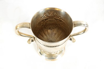 Lot 312 - A LATE GEORGIAN OLD SHEFFIELD PLATE TWO HANDLED TROPHY CUP