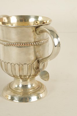 Lot 312 - A LATE GEORGIAN OLD SHEFFIELD PLATE TWO HANDLED TROPHY CUP