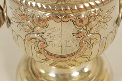 Lot 312 - A LATE GEORGIAN OLD SHEFFIELD PLATE TWO HANDLED TROPHY CUP