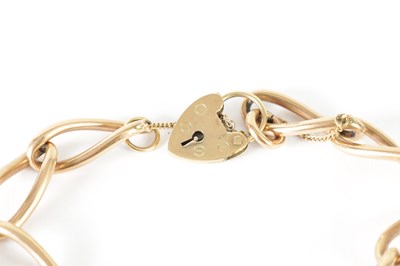 Lot 273 - A 9CT ROSE GOLD LOCKET BRACELET