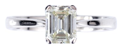 Lot 35 - A 14ct WHITE GOLD EMERALD CUT SOLITAIRE...