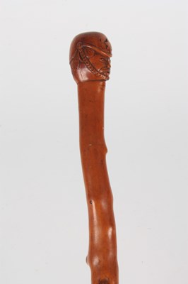 Lot 639 - A 19TH CENTURY FOLK ART CARVED HAWTHORN WALKING STICK