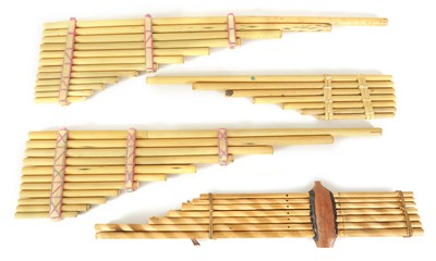 Lot 43 - A COLLECTION OF FOUR VARIOUS SIZE BAMBOO PANPIPES