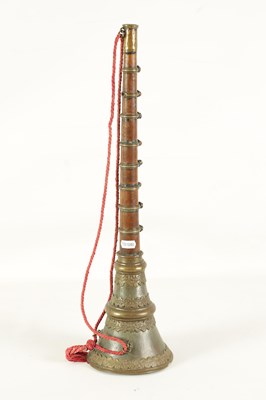 Lot 143 - A TIBETAN GAYALING RITUAL TRUMPET