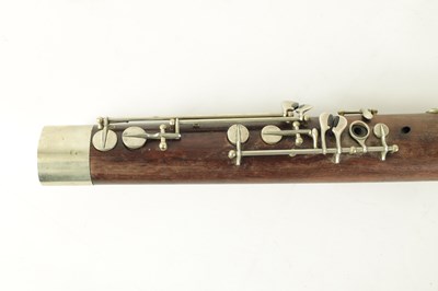 Lot 106 - AN EARLY 20TH CENTURY HAWKES & SON LONDON, EXCELSIOR SONORUS CLASS HARDWOOD BASSOON