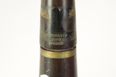 Lot 100 - A VINTAGE ROSEWOOD BESSON CLARINET
