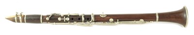 Lot 141 - A MID 20TH CENTURY MOUNTED ROSEWOOD CLARINET IN B