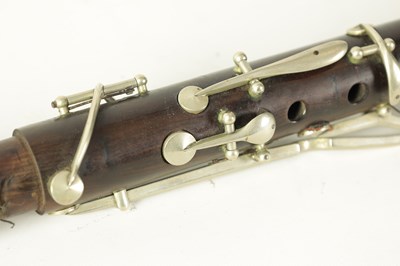 Lot 141 - A MID 20TH CENTURY MOUNTED ROSEWOOD CLARINET IN B