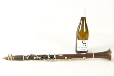 Lot 141 - A MID 20TH CENTURY MOUNTED ROSEWOOD CLARINET IN B