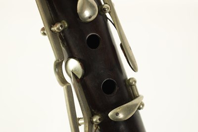 Lot 141 - A MID 20TH CENTURY MOUNTED ROSEWOOD CLARINET IN B