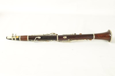 Lot 102 - A VINTAGE ROSEWOOD CLARINET