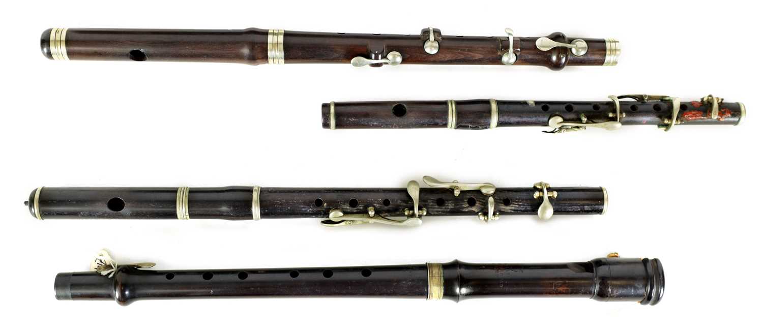 Lot 8 - A COLLECTION OF 19/20TH CENTURY ROSEWOOD FLUTES