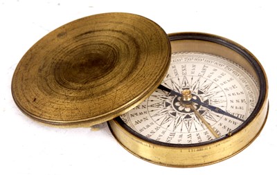 Lot 38 - A 19th CENTURY BRASS CASED COMPASS the...