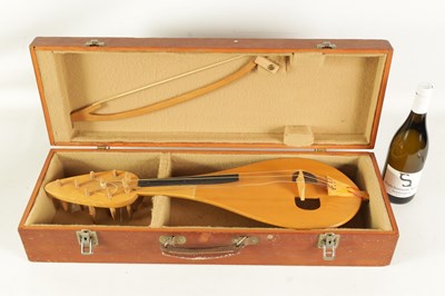 Lot 122 - A BULGARIAN MAPLE WOOD GUSLE AND BOW