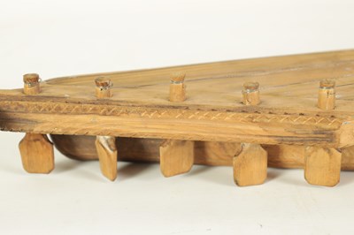 Lot 21 - A KANTELE BY CARLO BERGMAN, FINLAND