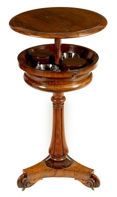 Lot 1370 - A LATE REGENCY FIGURED ROSEWOOD CIRCULAR POP-UP TEAPOY