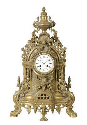 Lot 1116 - A LATE 19TH CENTURY FRENCH ORNATE AND PIERCED BRASS MANTEL CLOCK OF LARGE SIZE