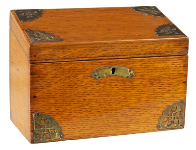 Lot 800 - A 19TH CENTURY OAK AND BRASS MOUNTED STATIONARY BOX