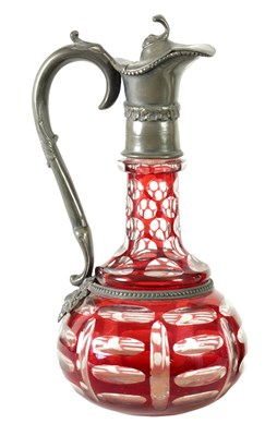 Lot 24 - A 19TH CENTURY BOHEMIAN GLASS CLARET JUG