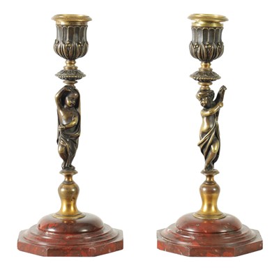 Lot 500 - A PAIR OF 19TH CENTURY BRONZE FIGURAL CANDLESTICKS