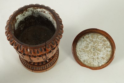Lot 784 - AN UNUSUAL LATE REGENCY OAK URN SHAPED TEA CADDY