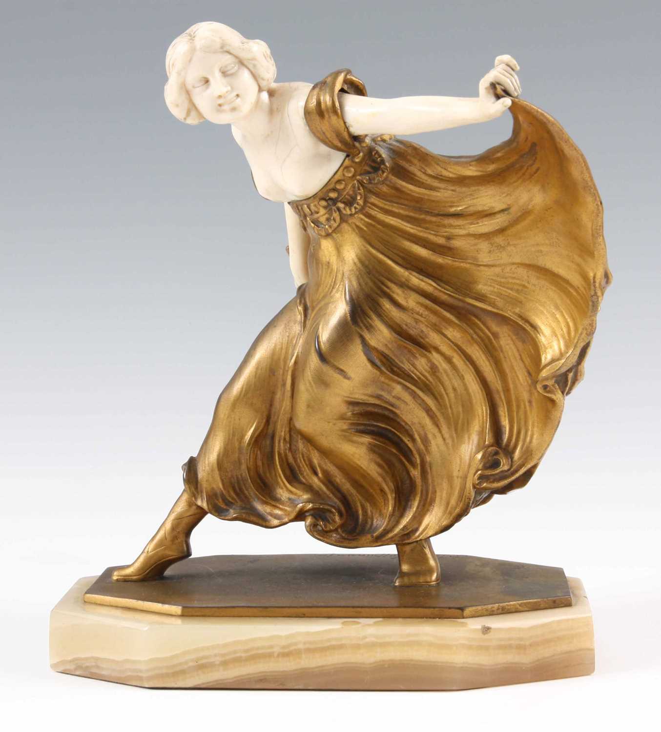 Lot 936 - ARTHUR HOFFMANN AN EARLY 20TH CENTURY GILT BRONZE AND IVORY SCULPTURE