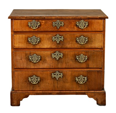 Lot 1410 - A GEORGE II WALNUT CHEST OF DRAWERS