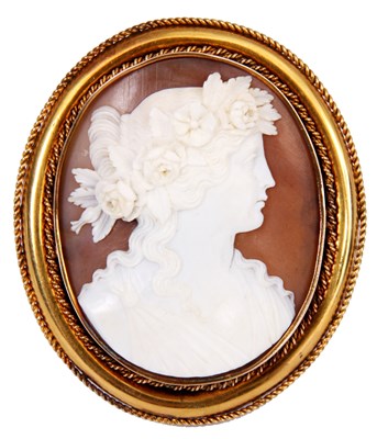 Lot 59 - A GOLD MOUNTED CAMEO BROOCH portrait of a...