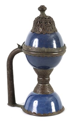 Lot 374 - AN 18TH CENTURY OTTOMAN METAL MOUNTED CHINESE POWDER BLUE PORCELAIN LAMP