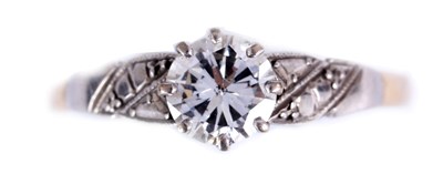 Lot 40 - A 9ct GOLD SOLITAIRE DIAMOND RING the diamond...