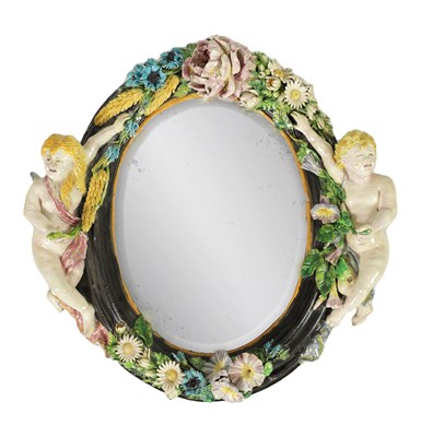 Lot 63 - A LARGE 19TH-CENTURY CONTINENTAL OVAL MAJOLICA HANGING MIRROR