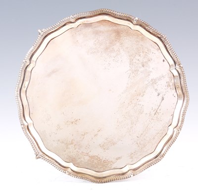 Lot 81 - A GEORGE V SILVER SALVER with feather edge...