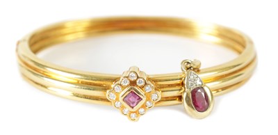 Lot 414 - AN 18CT GOLD RUBY AND DIAMOND BRACELET AND PENDANT