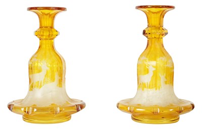 Lot 3 - A FINE PAIR OF 19TH CENTURY BOHEMIAN AMBER FLASHED GLASS DECANTERS