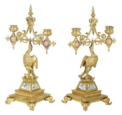 Lot 857 - A PAIR OF LATE 19TH CENTURY BRASS AESTHETIC PERIOD DOUBLE BRANCH CANDELABRA