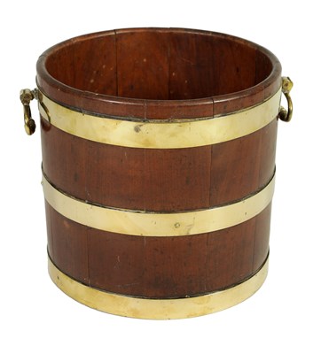 Lot 1379 - A GEORGE III BRASS BOUND MAHOGANY CIRCULAR PEAT BUCKET