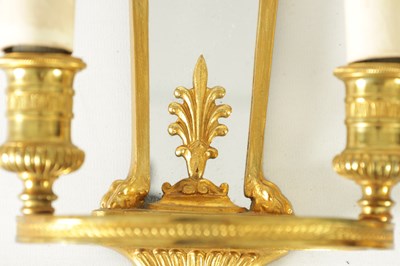 Lot 428 - A PAIR OF ORMOLU REGENCY STYLE TWO BRANCH WALL LIGHTS