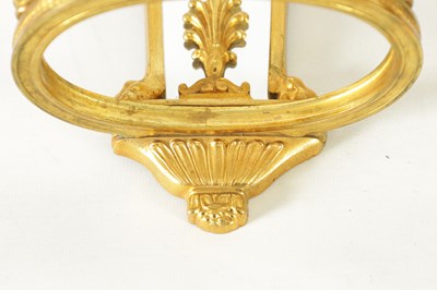 Lot 428 - A PAIR OF ORMOLU REGENCY STYLE TWO BRANCH WALL LIGHTS