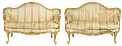 Lot 1399 - A PAIR OF GEORGE III ENGLISH CARVED GILTWOOD HEPPLEWHITE STYLE UPHOLSTERED SETTEES