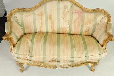 Lot 1399 - A PAIR OF GEORGE III ENGLISH CARVED GILTWOOD HEPPLEWHITE STYLE UPHOLSTERED SETTEES