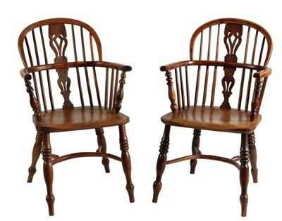 Lot 995 - A MATCHED PAIR OF 19TH CENTURY YEW WOOD LOW BACK WINDSOR CHAIRS